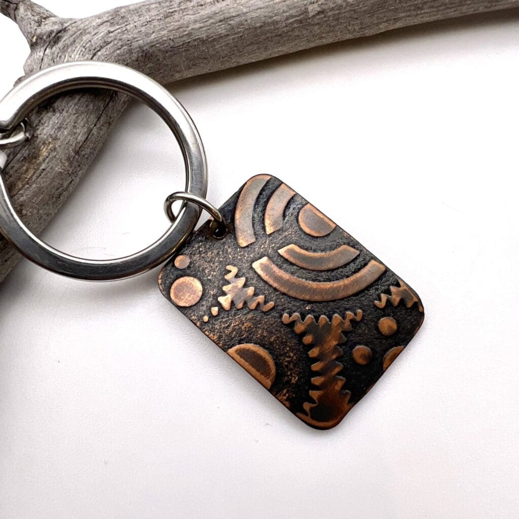 Make Your Own Jewelry Craft & Sip Salida Jewelry Design Studio Shop - gears stamped copper keychain key fob